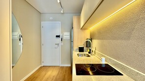 Fridge, microwave, stovetop, coffee/tea maker