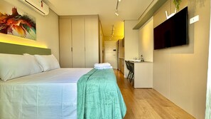 1 bedroom, desk, iron/ironing board, travel cot