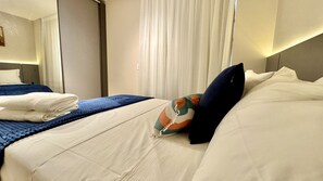 1 bedroom, desk, iron/ironing board, travel crib