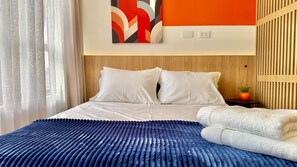 1 bedroom, desk, iron/ironing board, travel cot