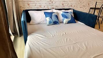 2 bedrooms, desk, iron/ironing board, travel crib