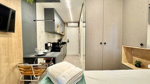 1 bedroom, desk, iron/ironing board, travel cot