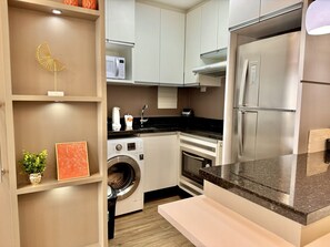 Fridge, microwave, stovetop, coffee/tea maker