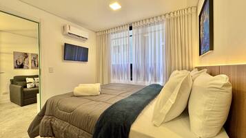 1 bedroom, desk, iron/ironing board, travel crib