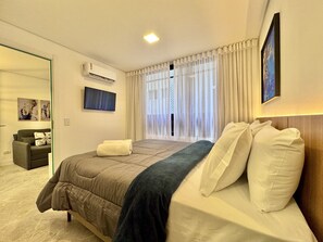 1 bedroom, desk, iron/ironing board, travel crib