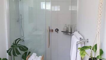 Shower, eco-friendly toiletries, hair dryer, towels