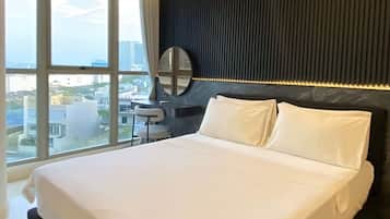 Deluxe Apartment, 2 Bedrooms, Balcony, City View | 1 bedroom, minibar, blackout drapes, soundproofing