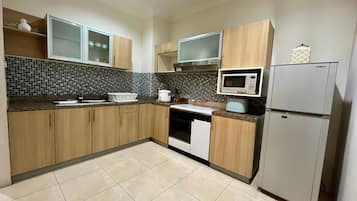 Appartement Deluxe, 2 chambres, balcon, vue ville | Cuisine privée