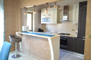 Fridge, microwave, oven, stovetop