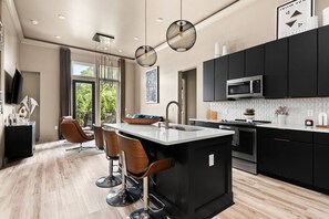 Fridge, microwave, dishwasher, coffee/tea maker