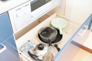 Fridge, microwave, stovetop, cookware/dishes/utensils