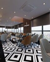 A modern dining area with geometric patterned flooring, contemporary furniture, and large windows offering a city view.