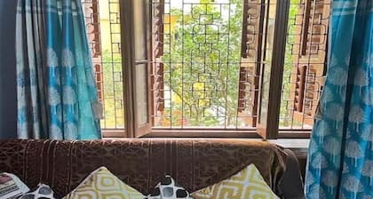 Jharna's Homestay with Kitchen,Dinning & a Garden view with in a City