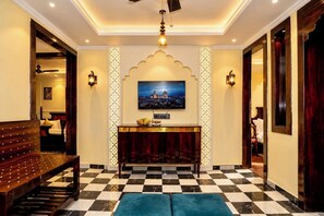 Three Bedroom Heritage Sunset Ganga View | Living area | 32-inch LED TV with digital channels - Evaara By The Ganges (Haridwar)