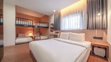 Family Room | Premium bedding, pillowtop beds, desk, laptop workspace