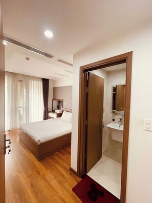 Deluxe Apartment, City View | 2 bedrooms, desk, laptop workspace, blackout curtains