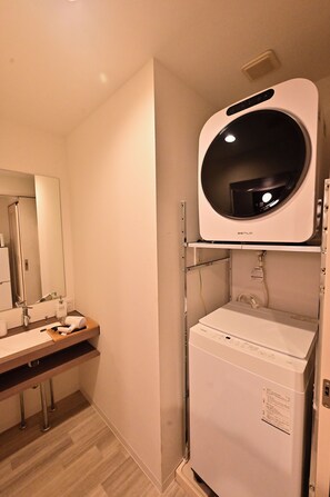 Basic Apartment, Balcony, City View | Bathroom | Separate tub and shower, free toiletries, hair dryer, slippers