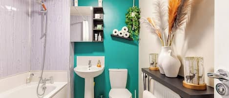 Shower, hair dryer, soap, shampoo