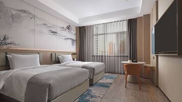 Desk, laptop workspace, free WiFi, bed sheets