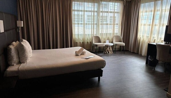 1 slaapkamer, een strijkplank/strijkijzer, gratis wifi, beddengoed