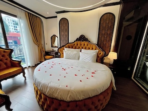 Luxury Suite, Balcony, City View | Premium bedding, memory foam beds, free minibar items, in-room safe