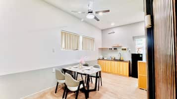 Family Quadruple Room, City View | Private kitchen | Fridge, stovetop, cookware/dishes/utensils