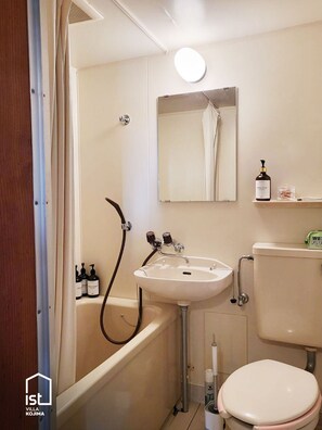 Hair dryer, towels, soap, shampoo