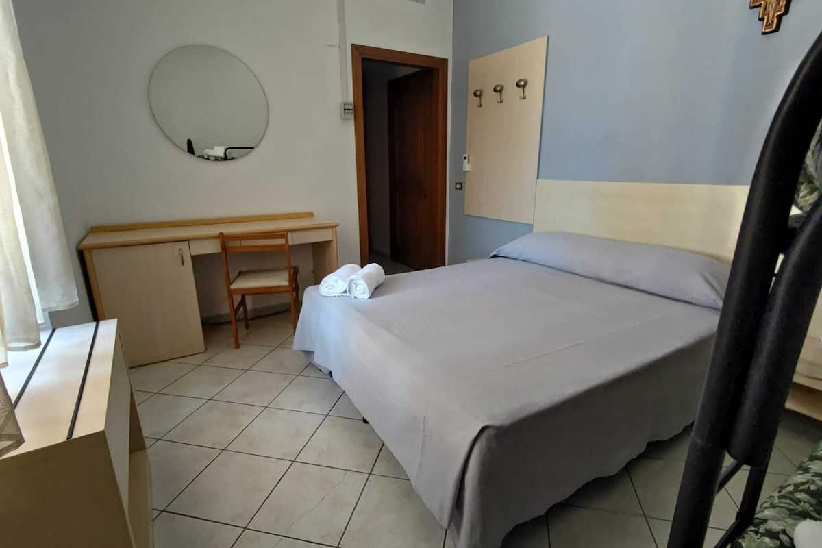 Standard Quadruple Room, Partial Sea View | In-room safe, desk, free WiFi