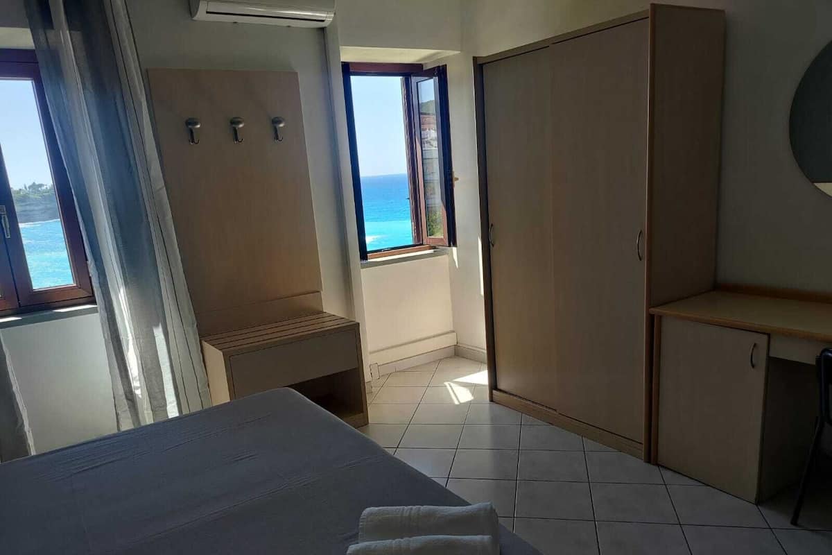 Deluxe Room, Sea View | In-room safe, desk, free WiFi