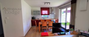 A modern kitchen with a coffee machine and a TV. - Christmas / New Year's Eve in the Mountains, including the KönigsCard (ski passes) (Pfronten)