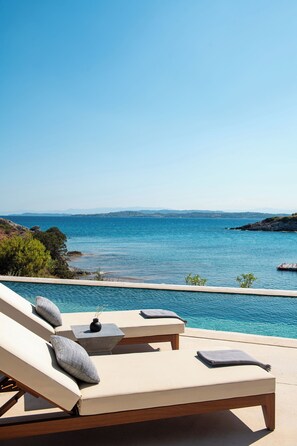 2 outdoor pools, pool umbrellas, sun loungers