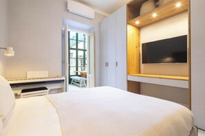 2 slaapkamers, een strijkplank/strijkijzer, wifi, beddengoed