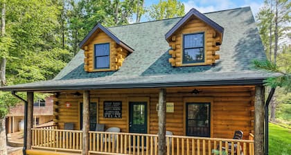 Main Channel Lots of Water. Escape to The Getaway at Pine Haven — a spotless log cabin on Smith Mountain Lake where every bedroom has its own en-suite bath. Enjoy lake views, a stocked kitchen, fire pit, pool table, and dock access.