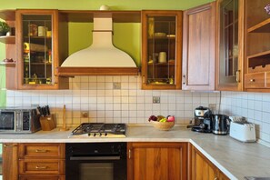 Family House, Multiple Bedrooms (Pianello Bellavista) | Private kitchen | Fridge, microwave, oven, stovetop