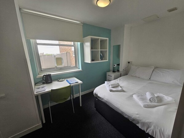 Desk, iron/ironing board, WiFi, bed sheets