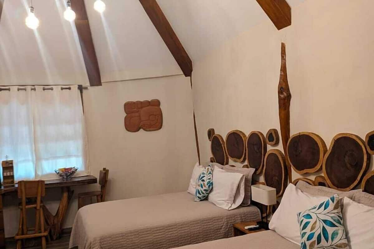 2 bedrooms, premium bedding, down comforters, individually decorated
