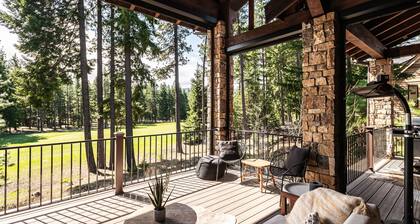 This idyllic Suncadia home features a speakeasy, cowboy cold dip, outdoor shower, private library, chef's kitchen, golf course views, and MORE