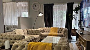 Living area - Duke Mews Loft: Cozy 1-Bedroom Apartment in Sandton: 15 Mins to Sandton City. (Sandton)
