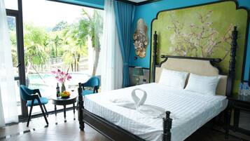 Deluxe Double Room, Pool View | Desk, laptop workspace, soundproofing, free WiFi