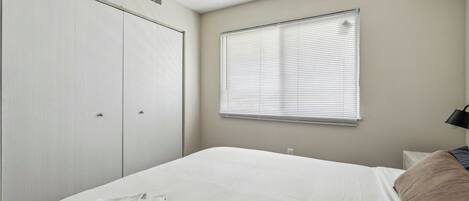 2 bedrooms, desk, iron/ironing board, travel crib