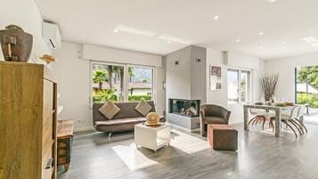 Standard Villa, Multiple Bedrooms, 2 Bathrooms (La Rotonda) | Living area | Flat-screen TV, fireplace