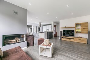 Standard Villa, Multiple Bedrooms, 2 Bathrooms (La Rotonda) | Living area | Flat-screen TV, fireplace - La Rotonda (Maroggia)