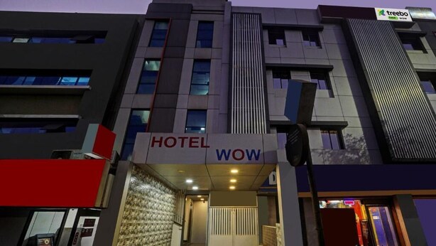 A hotel named "HOTEL WOW" with a modern facade, multiple floors, and a visible entrance. - HOTEL WOW (Surat)