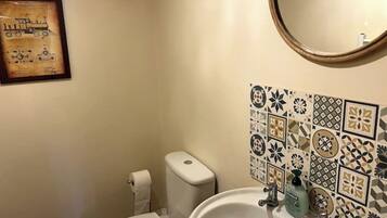 Shower, towels, soap, toilet paper
