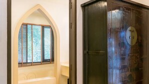 A room with a window with blinds, a wooden cabinet, and a door with a lock. - Balinese-inspired 3-bedroom villa with private pool, garden, and 5-min walk to Bang Kao Beach (Koh Samui)