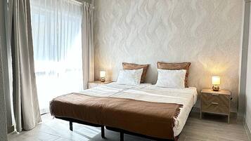 1 habitación, tabla de planchar con plancha, wifi y ropa de cama