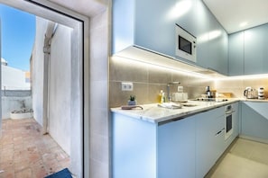 Fridge, microwave, oven, stovetop - Casa Matias - Stylish 4BR Apartment • Lagos Old Town (Lagos)