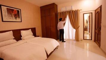 Deluxe Double Room, City View | Desk, free WiFi