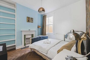 2 dormitorios, tabla de planchar con plancha, Internet y ropa de cama