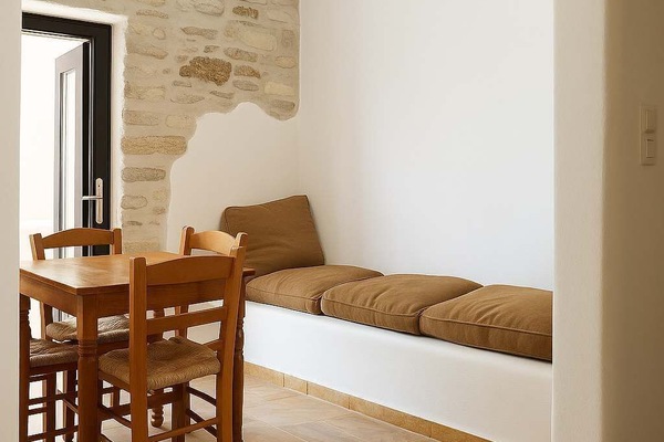 Traditional Living Room Area – Bright and airy space with simple island-style furnishings.